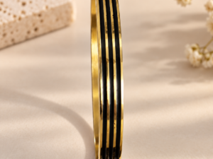 Black gold bangle for women with glossy black detailing