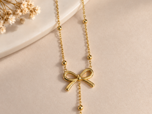 Gold plated bow necklace for women with 4 cm hanging locket