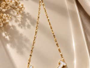 Gold plated pendant necklace with curved locket for women